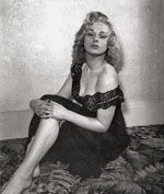 Sabrina sitting on carpet