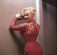 Sabrina (Norma Sykes) in a doorway