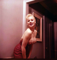 Sabrina in a sexy doorway