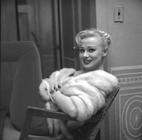 Sabrina in a furry doorway