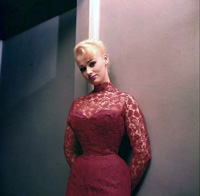 Sabrina (Norma Sykes) in a doorway