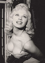 Sabrina nearly falls out