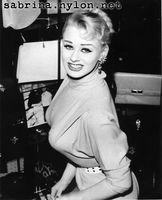 Sabrina shopping for handbags